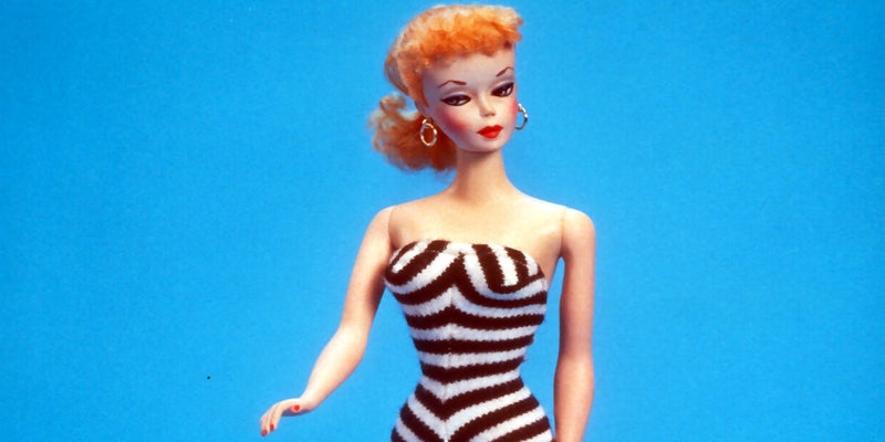 The original 1959 barbie doll in black and white swimsuit.