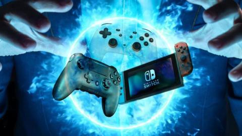 Three video game controllers with a blue background and a burst of whit light