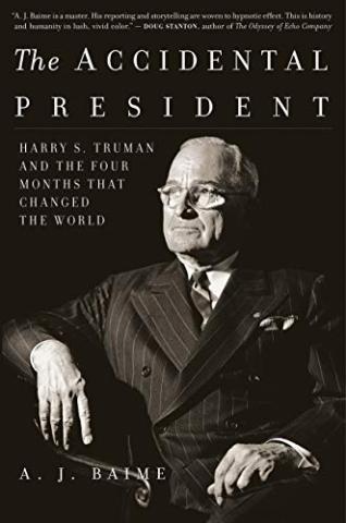 President Harry Truman sitting in a chair on book cover.