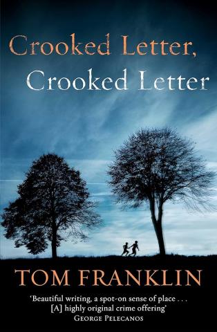 Book cover with dark sky and two trees on it.