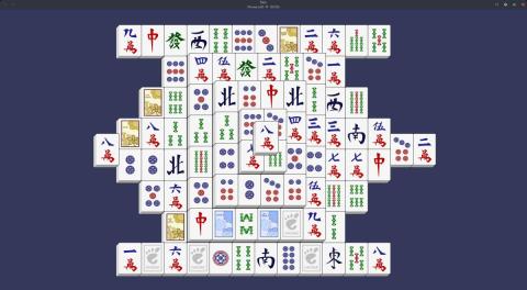 White Mahjong tiles with symbols on them on a blue background.