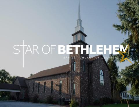 Image of Star of Bethlehem Baptist Church in Ossining.  Brown brick building with blue sky and green tree.