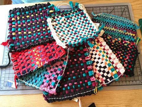 Community weave squares.  Multi-colored fabric.