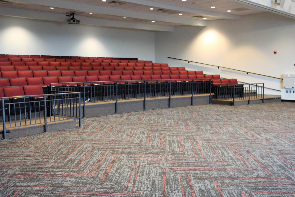 Audience Seating with red chairs.