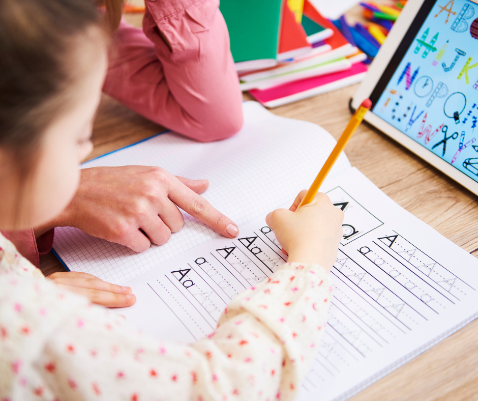 Child working on a workbook assignment