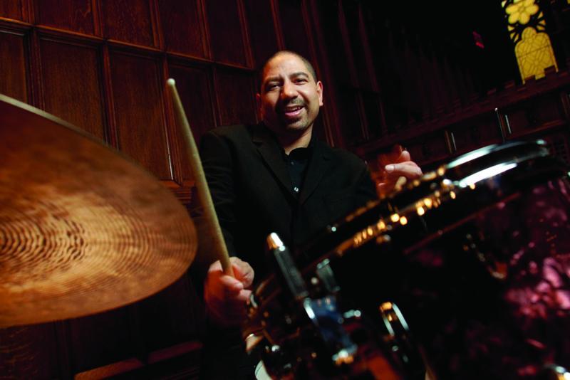 Musician Tony Jefferson playing the drums.