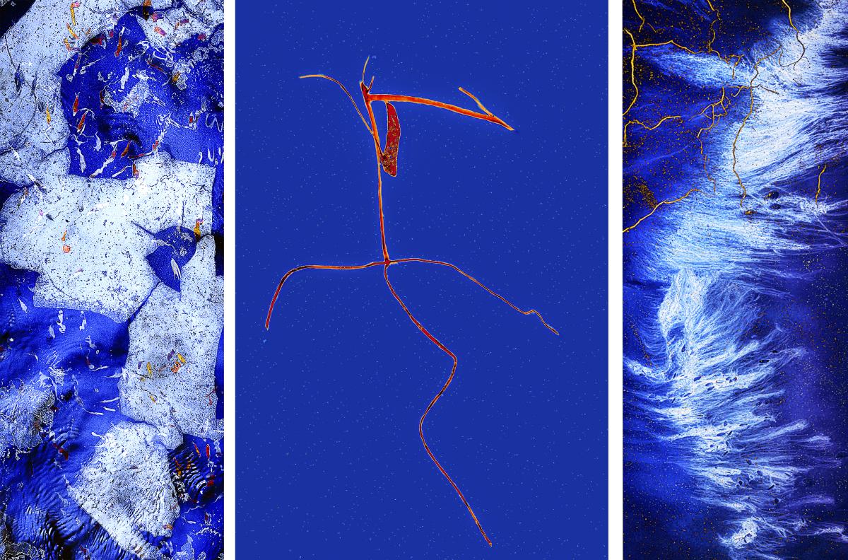 Blue abstract image with a touch of red.